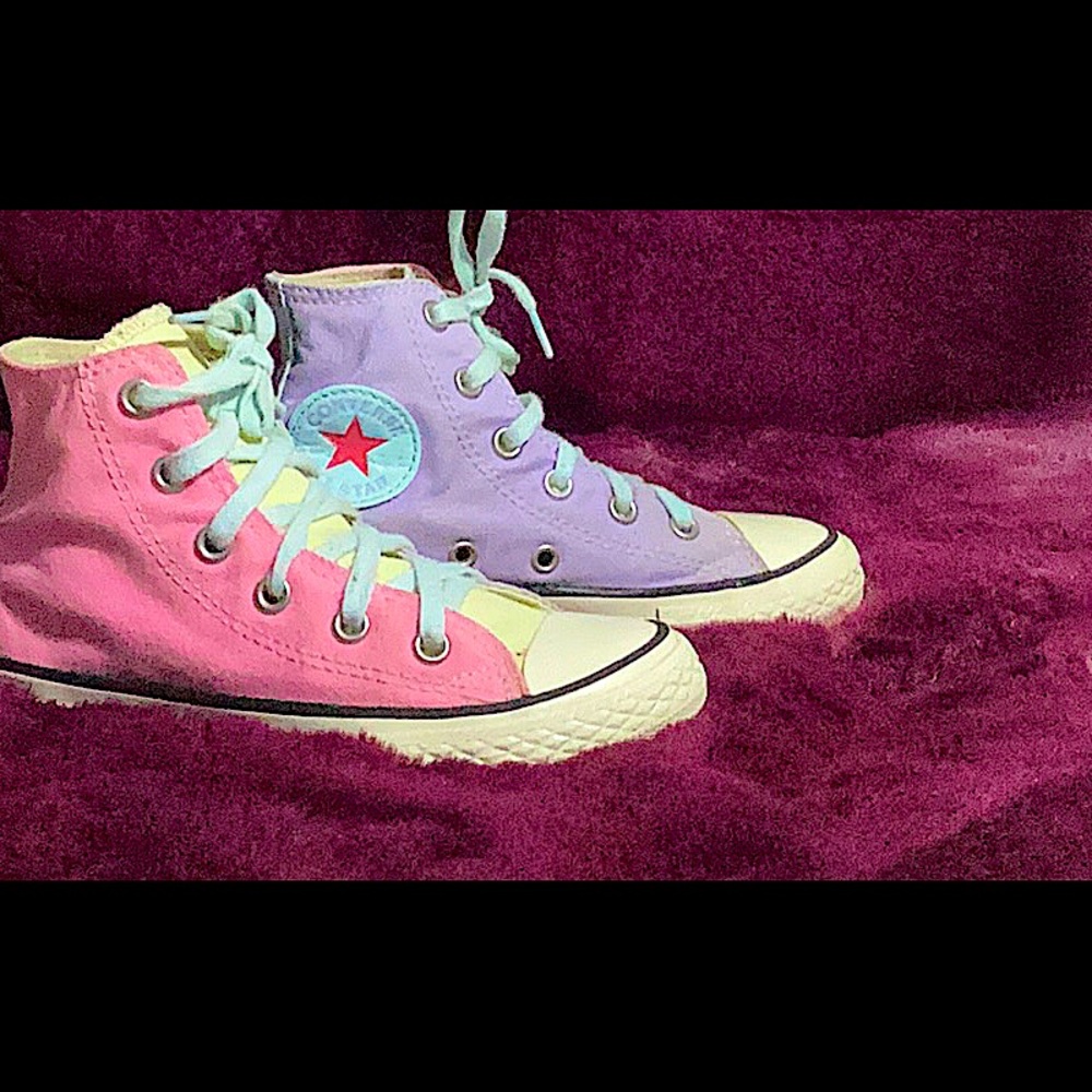 Purple, pink ,blue and yellow converse.